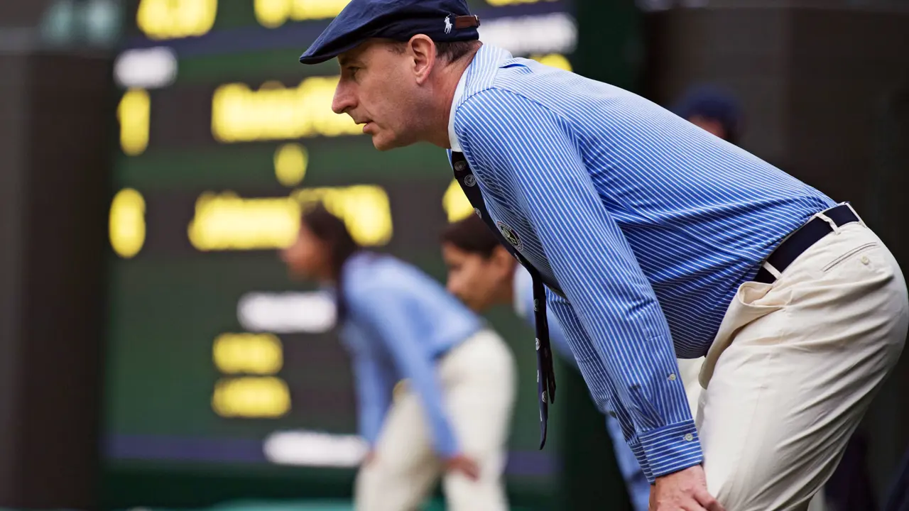 Man watching Wimbledon Tennis 