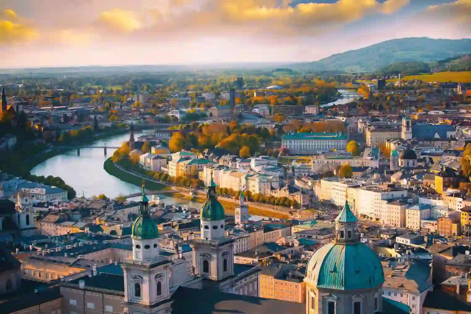 Panoramic view of the historic city of Salzburg and the Salzach Rriver in the evening light
