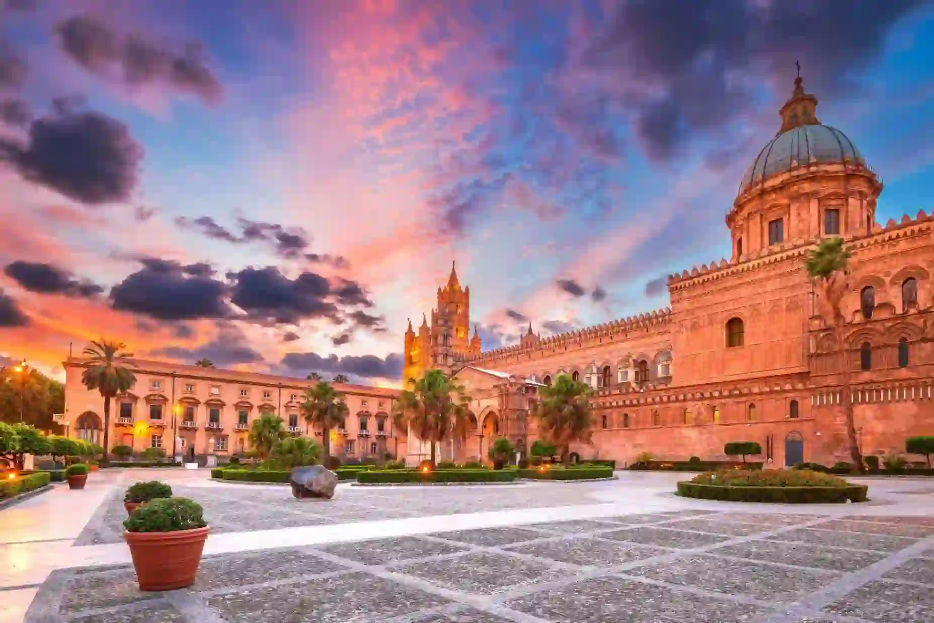 Palermo Cathedral at sunset, with warm light highlighting its historic architecture