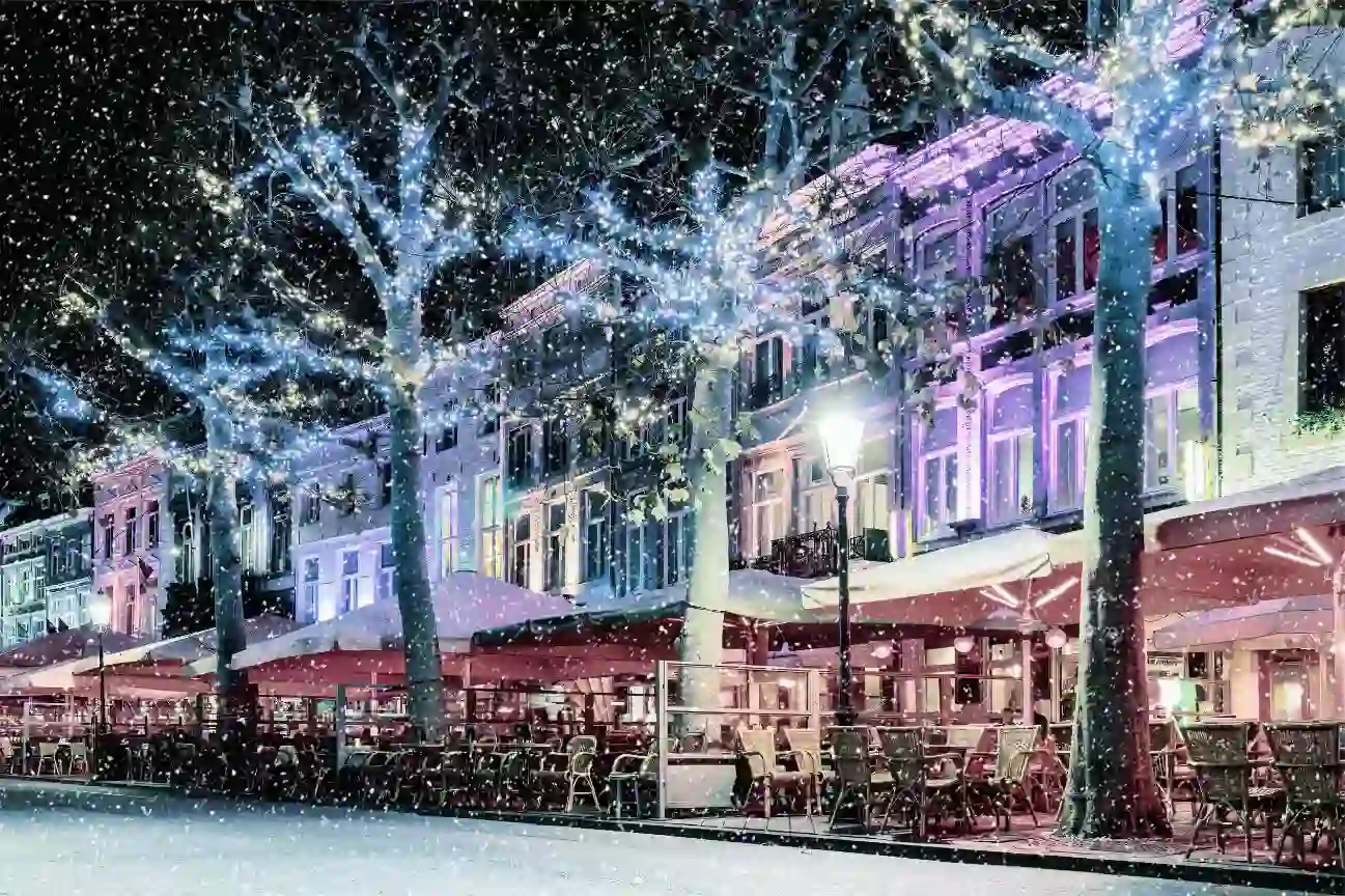 Christmas lights and snow on the Vrijthof Square in Maastricht 